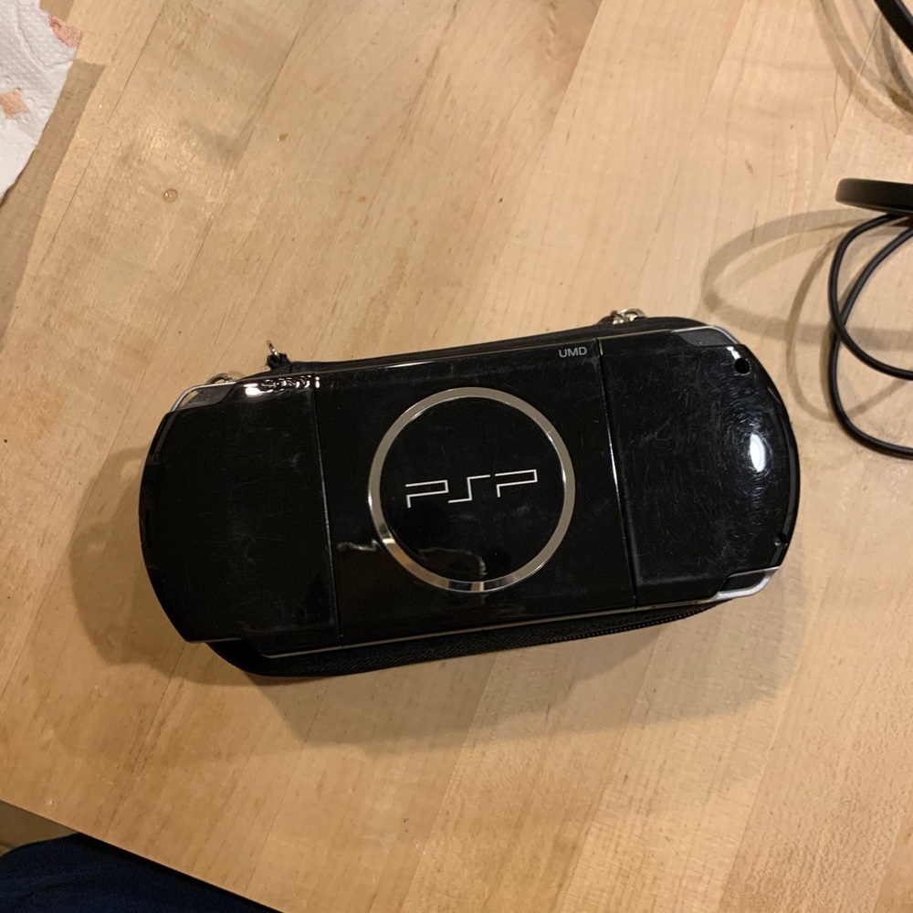 PSP With games and a Charger - Picture 5 of 7